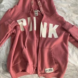 pink zip up sweatshirt